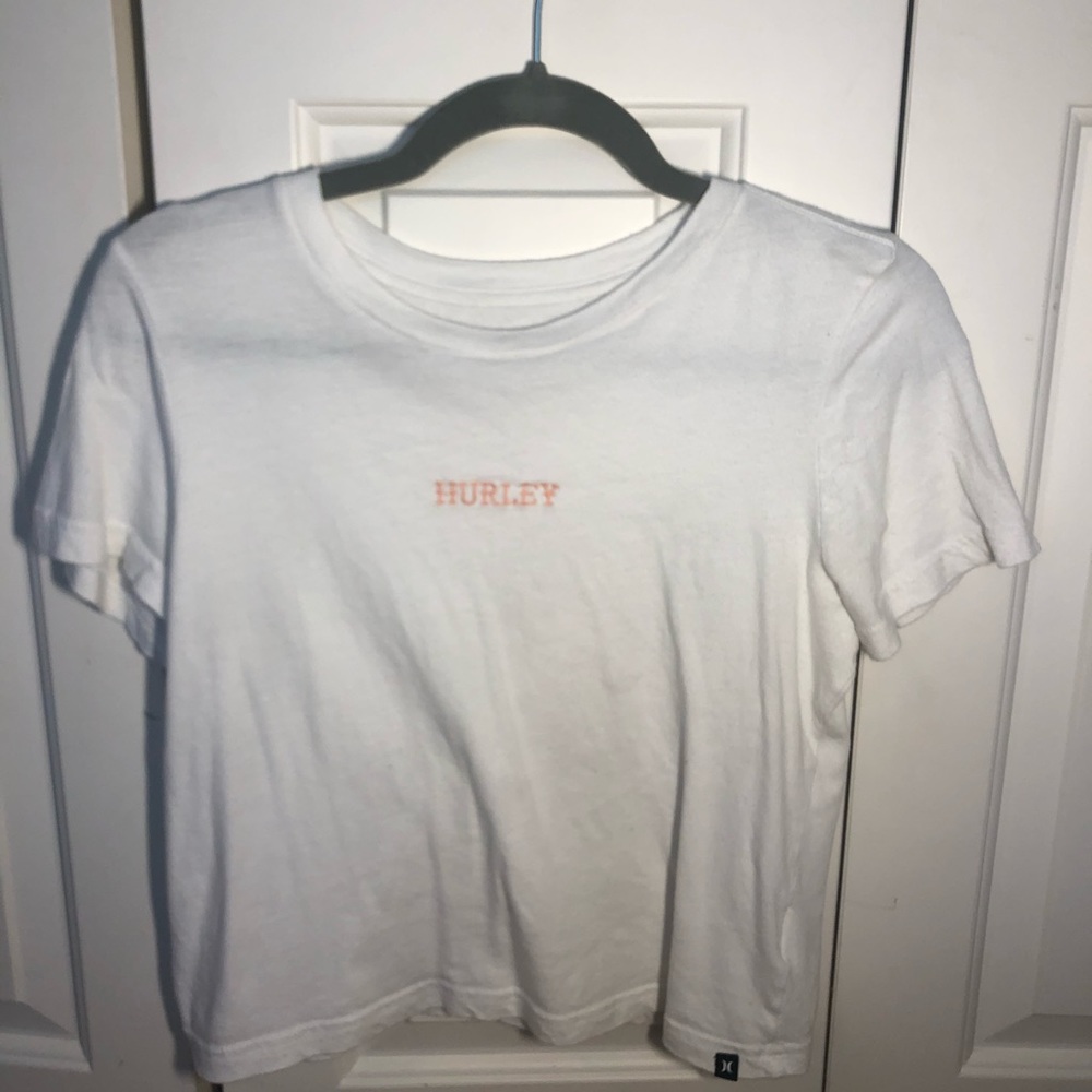 Hurley tee shirt with pink lettering